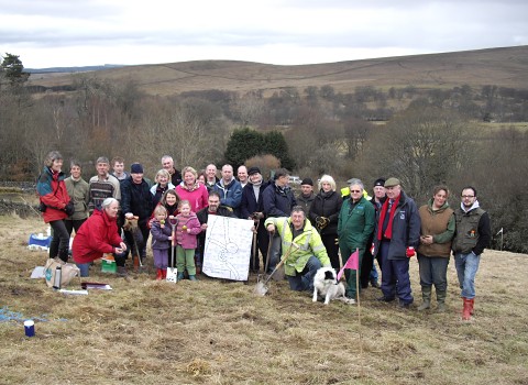 Members of Parish Council, the community and from the Northumberland National Park Authority at the end of the successful planting day