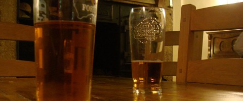 Photograph of partially-drunk beer glasses